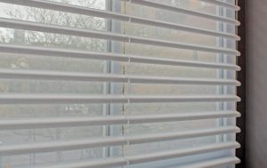 close up of sheer pirouette shades on large window in Chicago IL home
