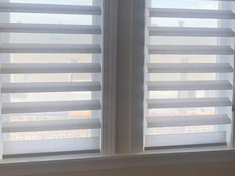 pirouette window shades on double windows by Hunter Douglas Chicago 60611