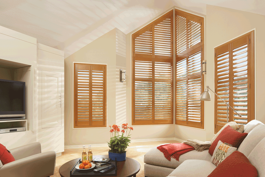 medium wood tone interior shutters for angled windows Hunter Douglas Beaverton 97005