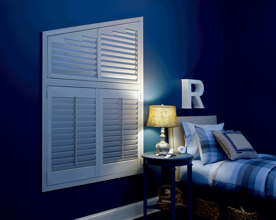 boy's blue bedroom with room darkening shutters