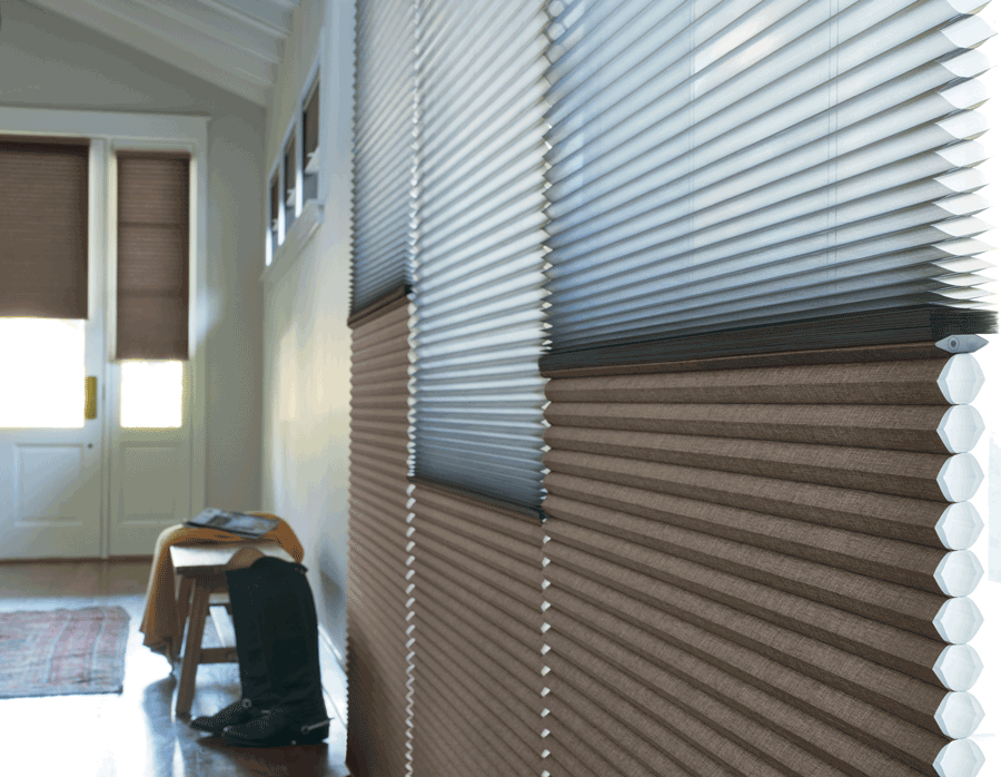 duette honeycomb shades down long hallway with roller shades on entryway door Chicago IL