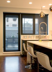 black screen roller shades on kitchen door for outdoor patio in Chicago IL