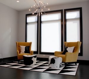 black, white and yellow theme in Chicago IL home with white roller screen shades