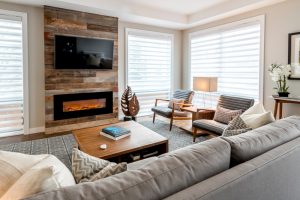 designer living room with large windows covered with white window shades in Chicago IL