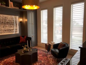 three tall living room windows with silhouette shades in Hinsdale IL
