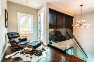 skyline window coverings design portfolio black roller shades in glass staircase Chicago IL