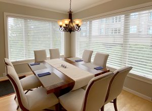 dining room with large windows covered with see-through silhouette shades Naperville IL
