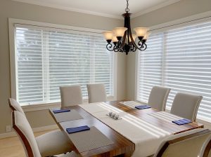 corner of dining room with white silhouette sheer shades in Naperville IL
