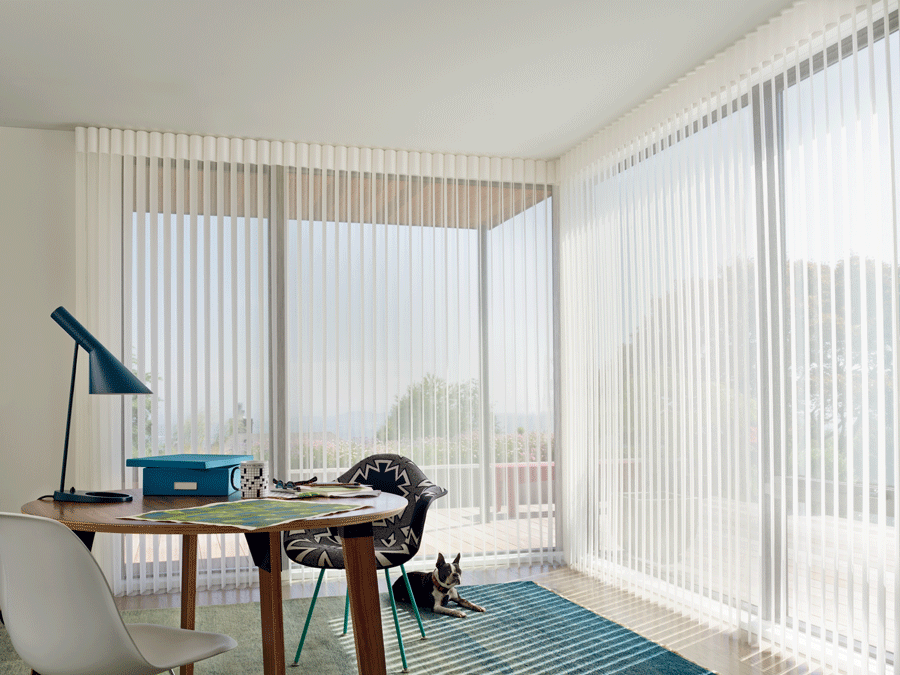 Luminette view through sheer vertical shades allow for the perfect amount of light to come into your home office.