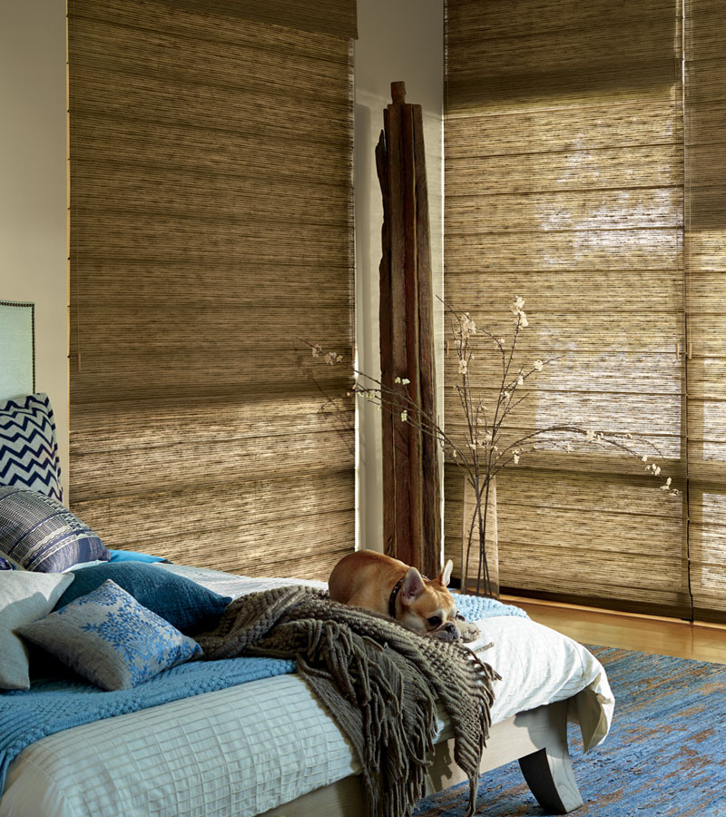 dual roman shades with alustra woven fabrics in bedroom Portland OR