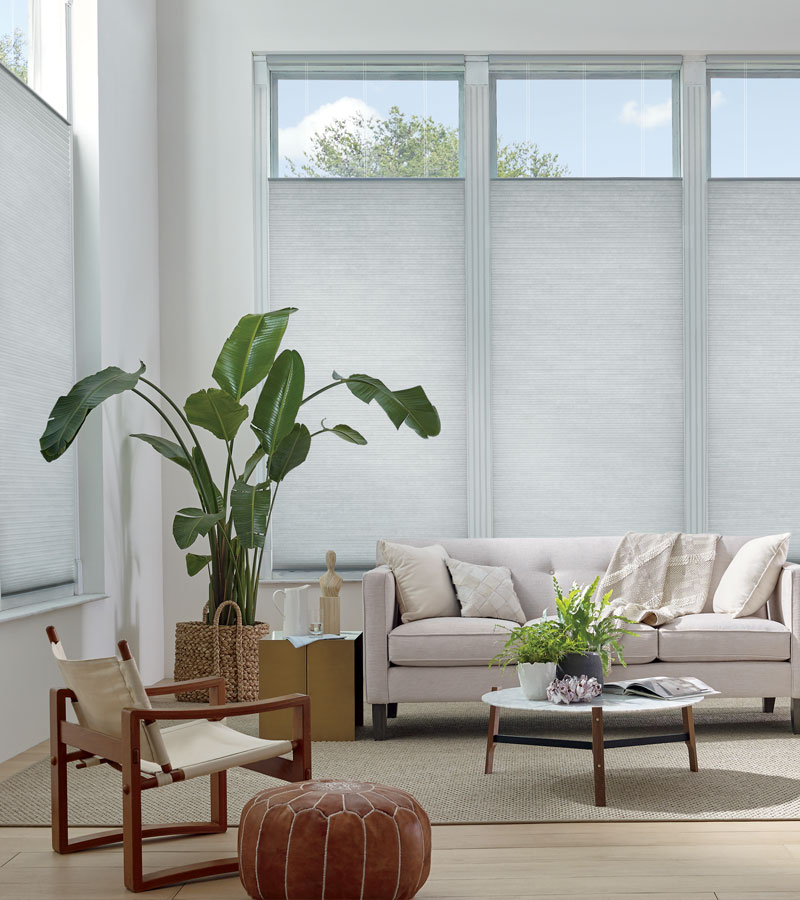 top down honeycomb shades in living room with high ceilings Hinsdale IL