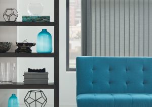 large window behind couch with gray vertical blinds in Chicago 60614