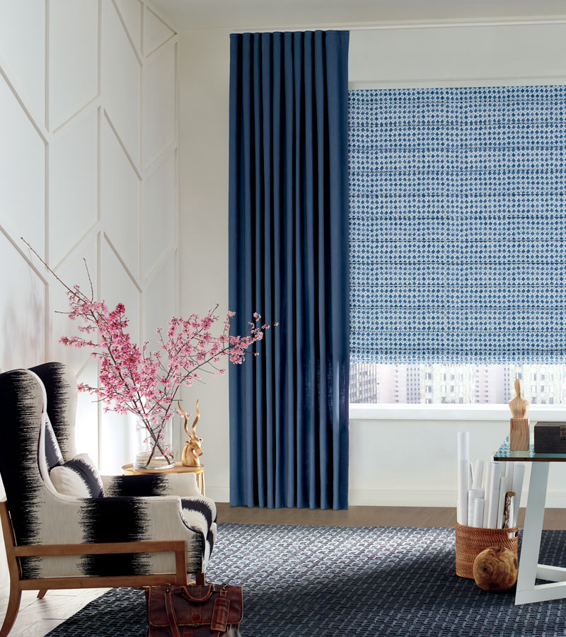 white board and batten feature wall with blue draperies and patterned roman shades Chicago 60657