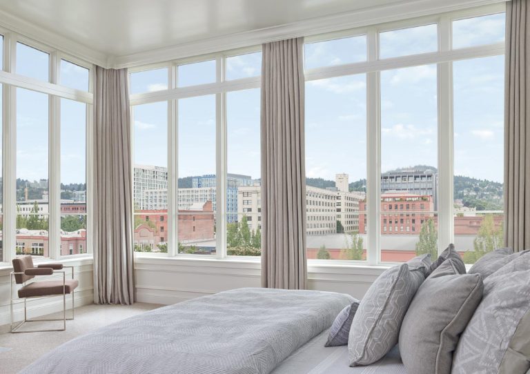 floor to ceiling windows with draperies in Portland OR