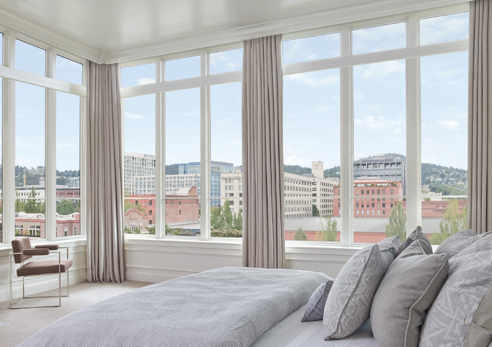 floor to ceiling windows with draperies in Portland OR