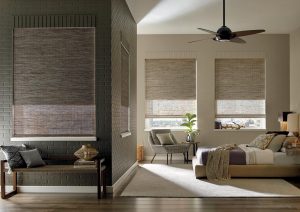 woven wood shades with dual shade system in exposed brick open floor plan home in Naperville IL