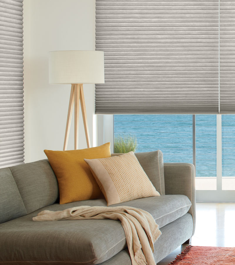 gray duette cellular shades in living room for energy savings in Portland OR home