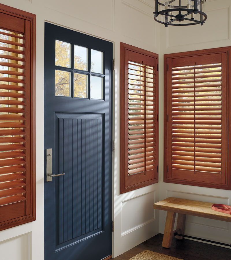 entryway windows covered with wood shutters in Portland OR