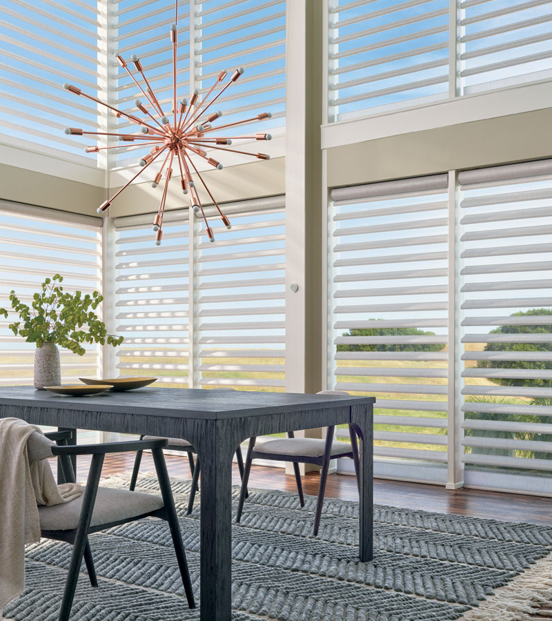 floor to ceiling windows with sheer and fabric pirouette shades in Vancouver WA home