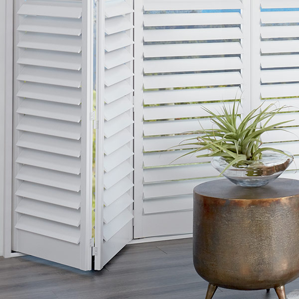 white bi-fold shutters for large windows and sliding doors in Vancouver WA