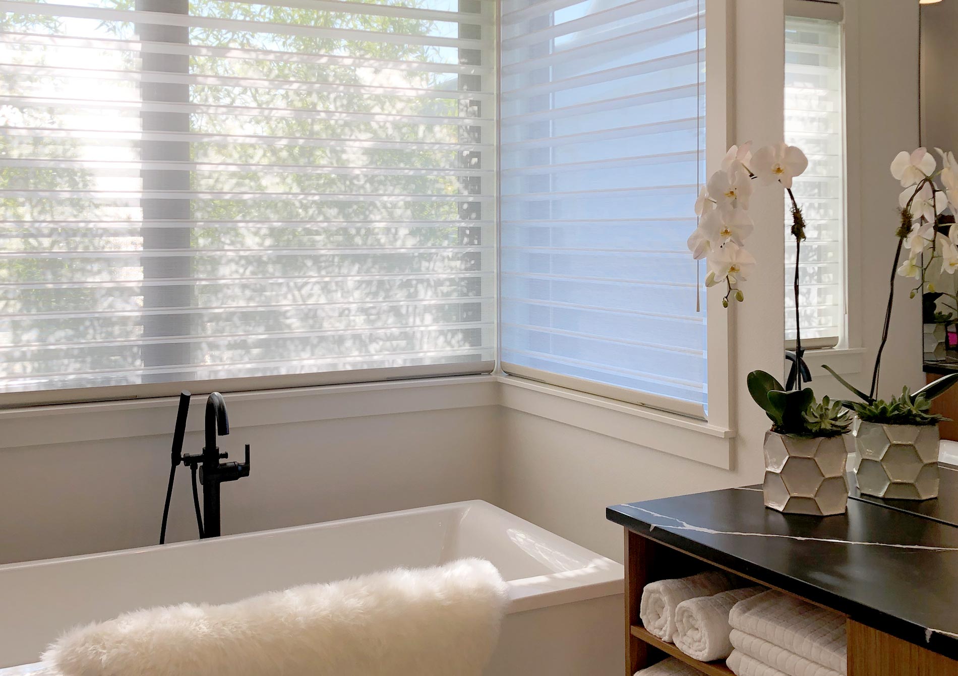 corner windows above tub with silhouette shades in Vancouver WA