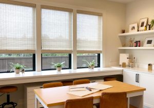 homeschool setup in home office with woven wood shades Portland OR