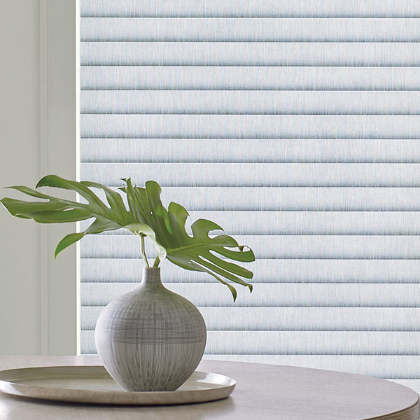 close up of new cellular roller shades with plant in Chicago IL