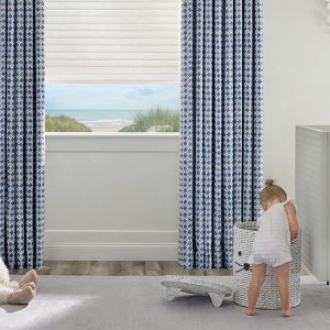 blue diamond pattern drapery panels with cellular roller shades Vancouver WA