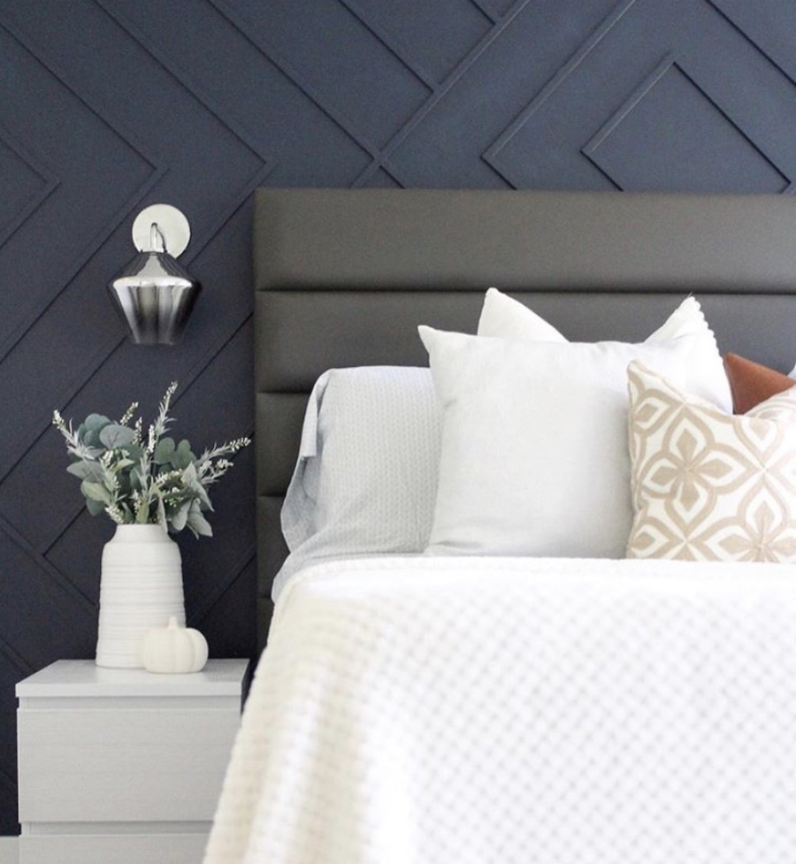 blue board and batten feature wall in bedroom