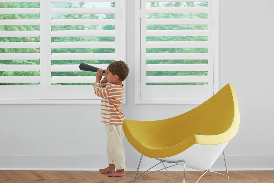 white plantation shutters are childproof window treatments in Chicago home