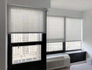 textured gray roller shades on black frames in Chicago 60614