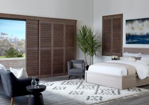 newstyle composite plantation shutters dark wood grain finish in bedroom Vancouver WA