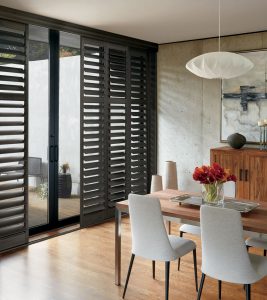 black shutters on sliding glass doors in Chicago IL dining room