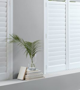 white plantation shutters on windows in Portland OR home