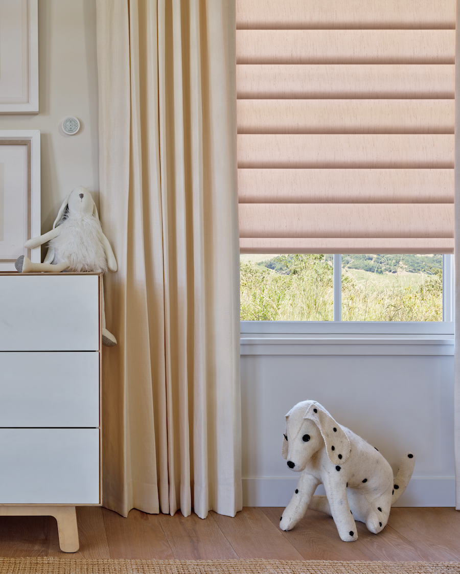 peach colored window shades in nursery in Portland OR home