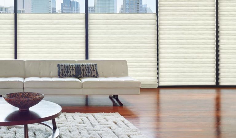 top down roman shades on floor to ceiling windows in Chicago 60611