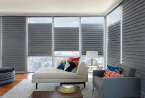 living room with top down roman shades to increase light in Portland OR