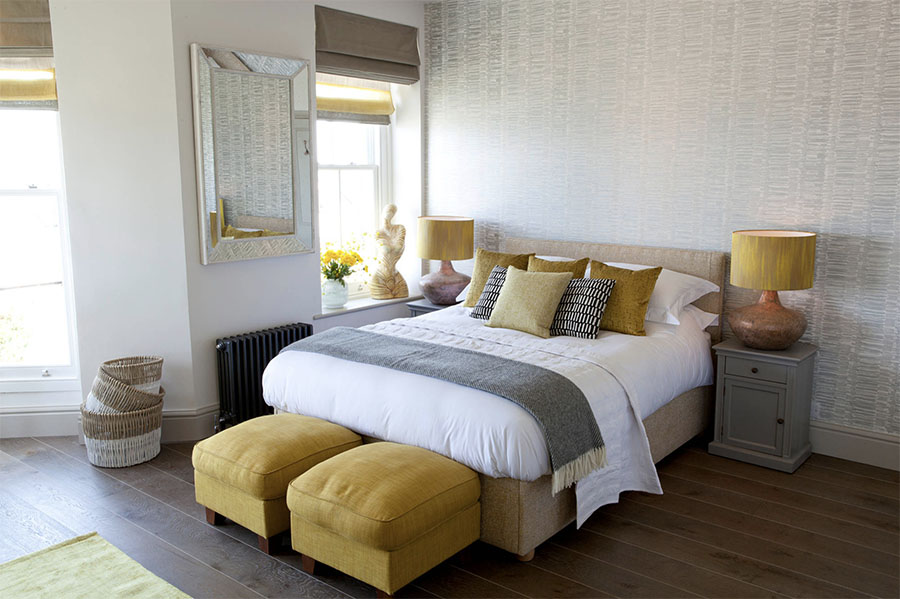 gray and yellow colors in master bedroom