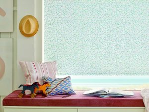 Window seat with patterned roller shades Vancouver WA