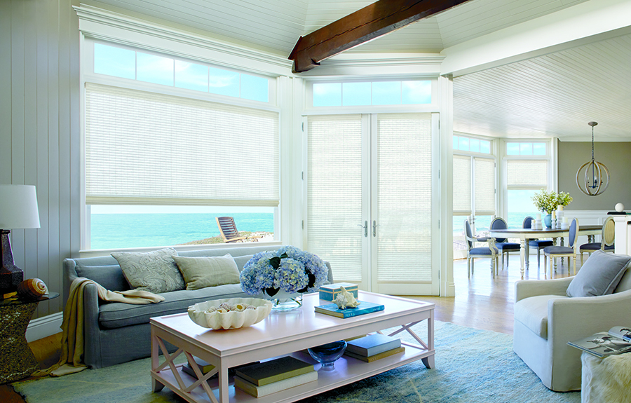 white woven wood shades covering doors in Chicago IL condo