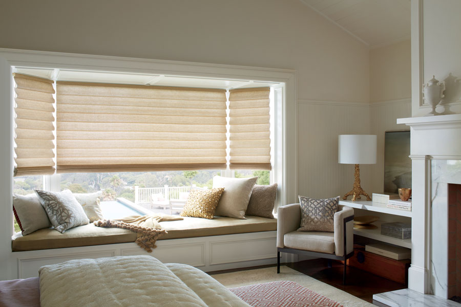 modern roman shades on bay window in bedroom for relief from the sun Chicago IL