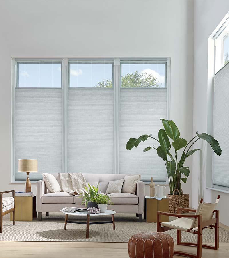 white living room with gray top lowering window treatments in Vancouver WA