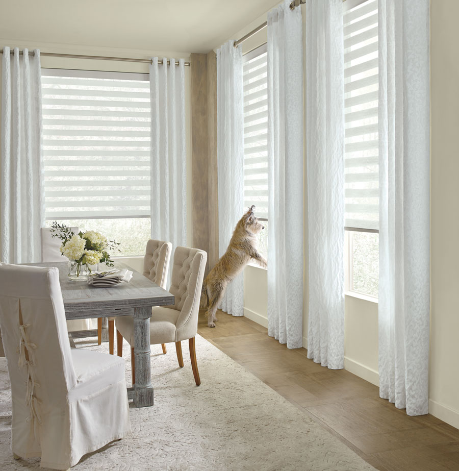 Designer banded shades in dining room