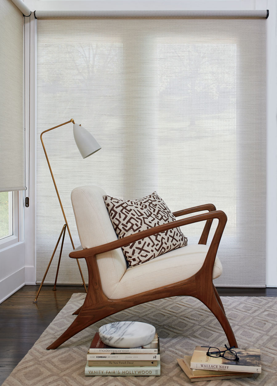 white bleached roller shades over patio door in these fabrics keeps the sun at bay