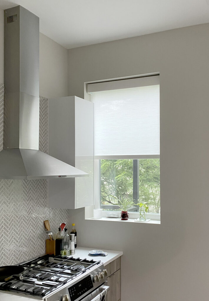 modern kitchen with roller shade