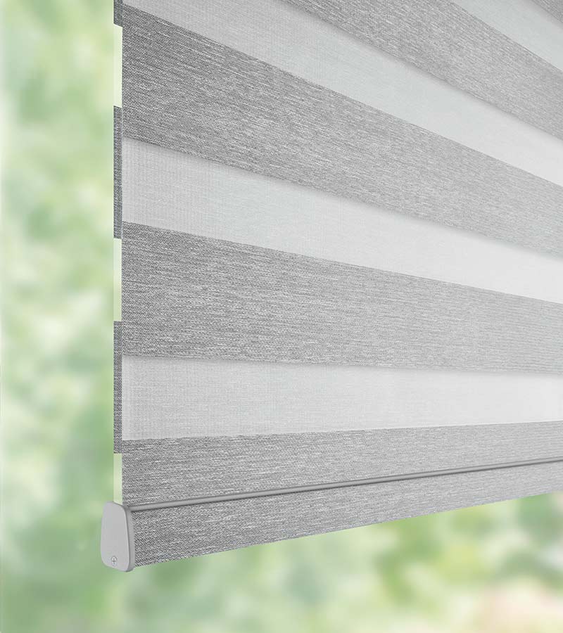 close up detail of gray automated window shade for room darkening Portland, OR