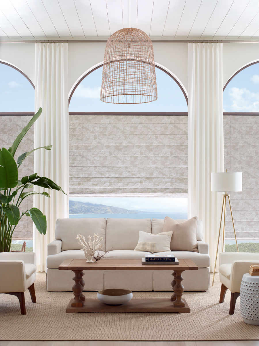 Arched windows roman shades in living room