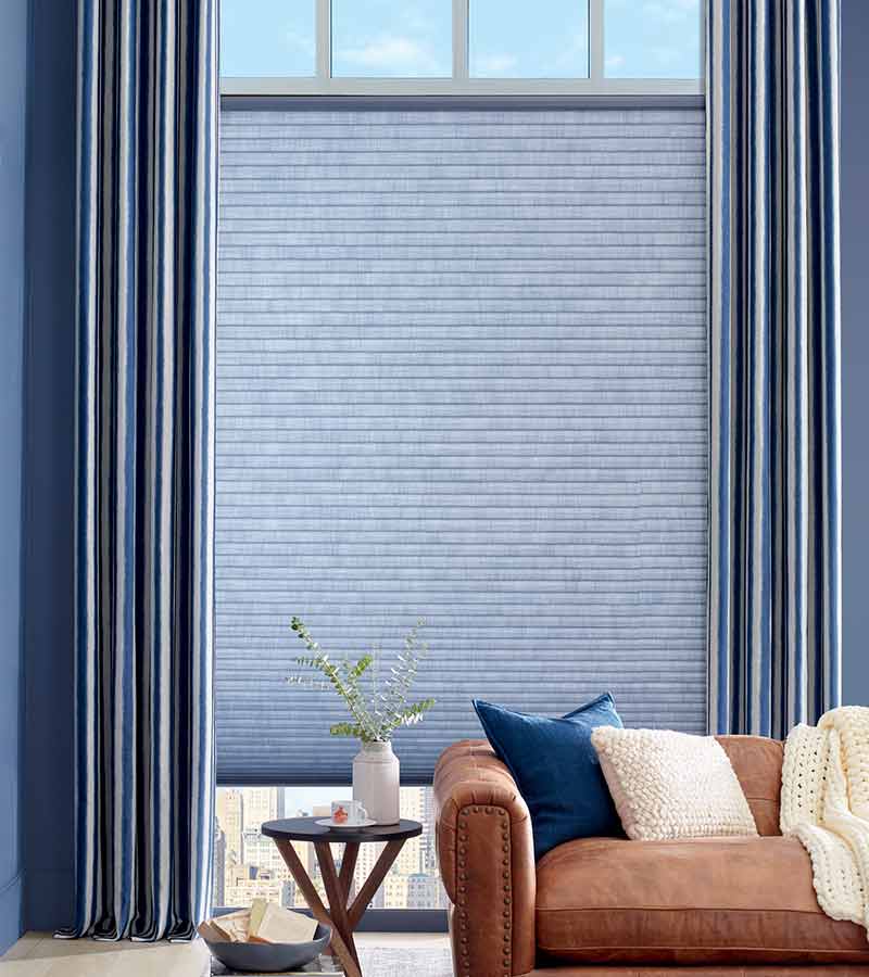 blue floor to ceiling window coverings with striped patterned for energy efficiency Chicago, IL