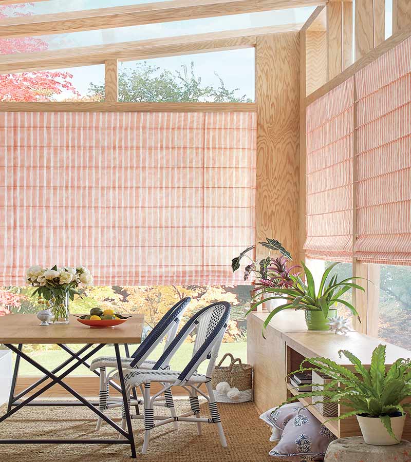 outdoor sunroom with pink coral striped window shadings Portland, OR