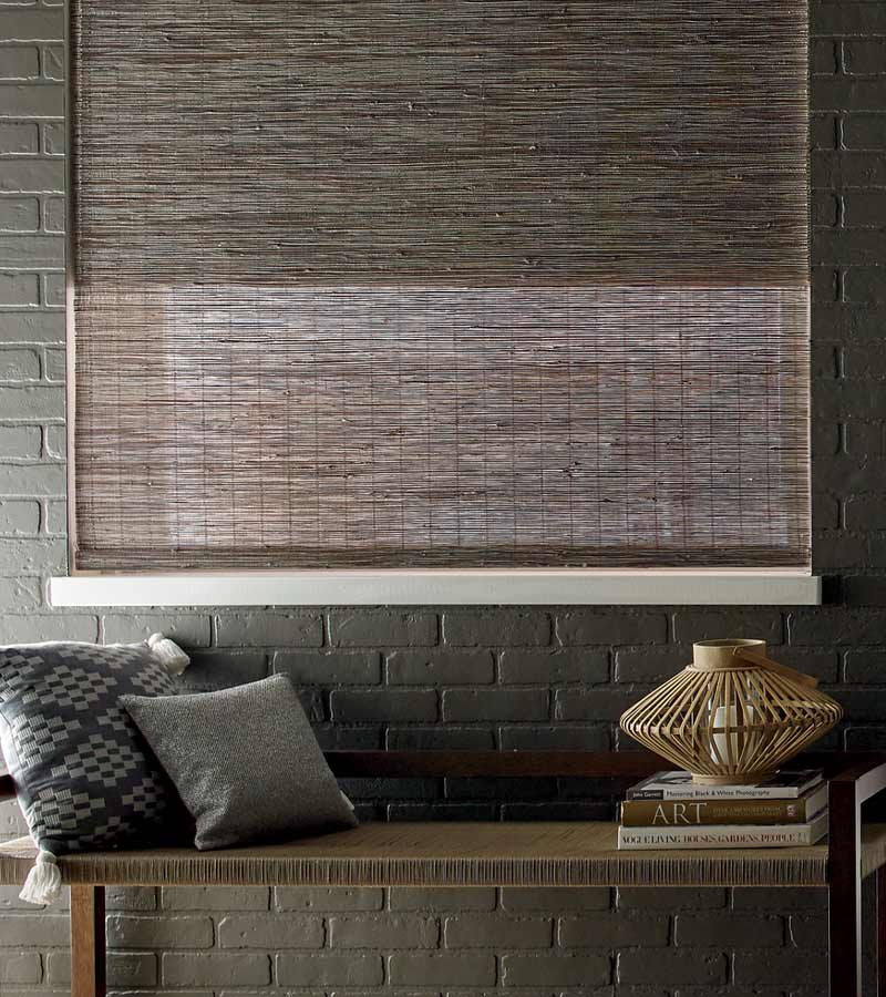 exposed brick wall painted black with coordinating dark brown window treatments in winnetka, IL